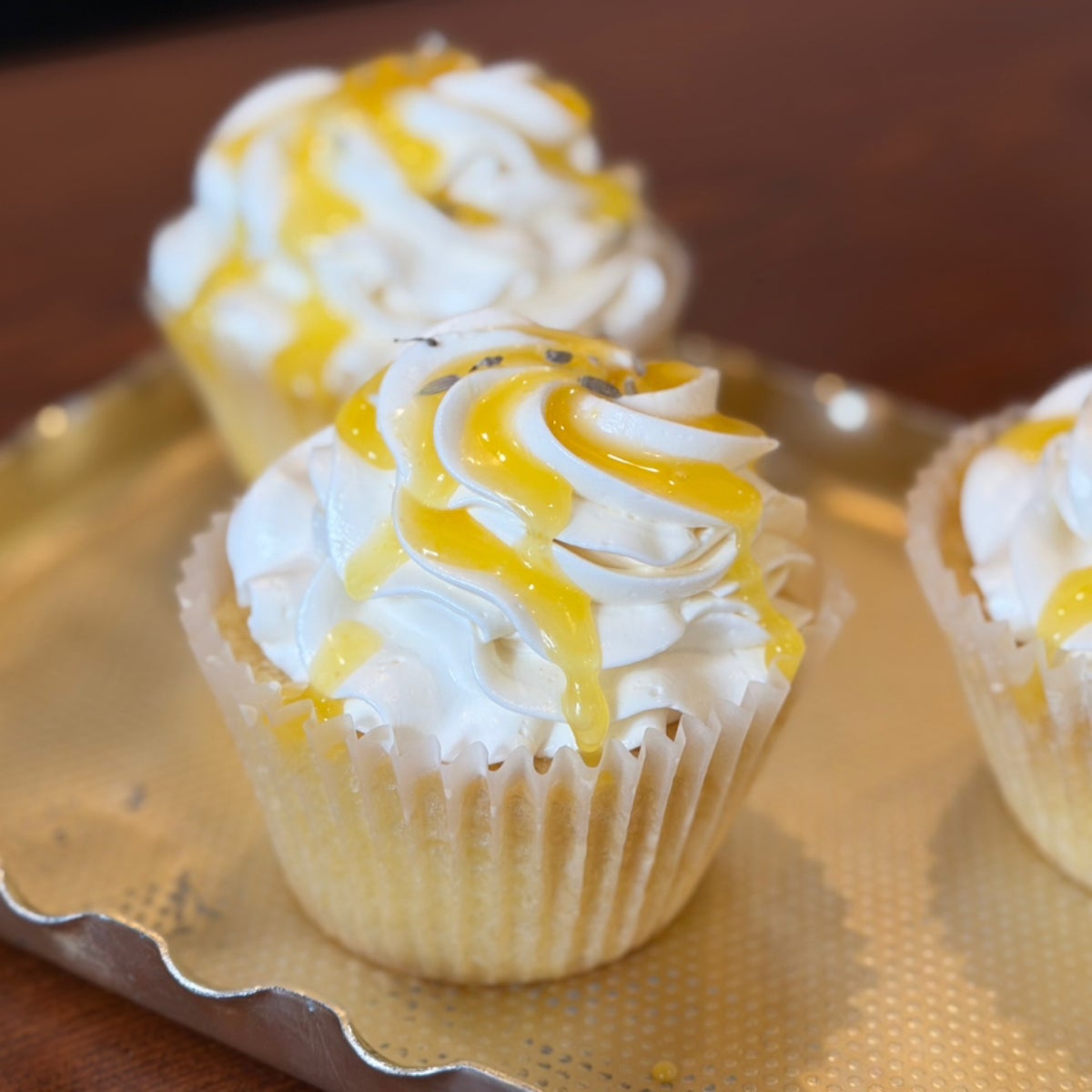Cupcakes with whipped frosting and citrus drizzle